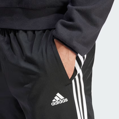 ADIDAS | ESSENTIALS WARM-UP TAPERED 3-STRIPES TRACK PANTS